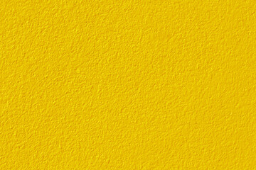 Golden yellow Concrete Wall Texture For Background And Design.