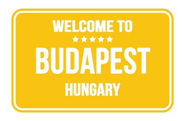 WELCOME TO BUDAPEST - HUNGARY, words written on yellow street sign stamp