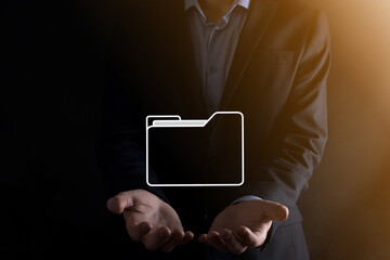 Businessman hold folder icon.Document Management System or DMS setup by IT consultant with modern...