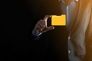 Businessman hold folder icon.Document Management System or DMS setup by IT consultant with modern...