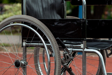 The concept of a wheelchair on the sports ground, a disabled person, a fulfilling life, paralyzed. Wheelchair on the basketball court.