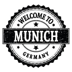 WELCOME TO MUNICH - GERMANY, words written on black stamp