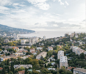Fototapeta na wymiar Crimea, Yalta, city landscape. View of the architecture and Yalta bay, black sea.