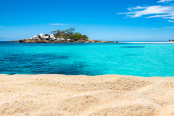 Fototapeta premium white sand and beautiful tropical beach; Background image for product placement.