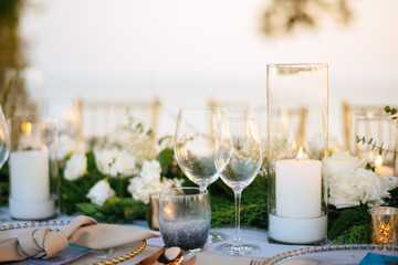 Table setting at a luxury wedding and Beautiful flowers on the table.