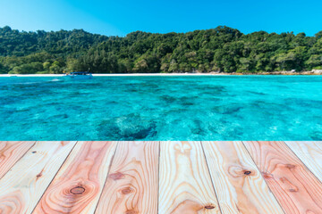 Wooden floor or plank on Calm Sea and Blue Sky Background. For product display. - 449833441