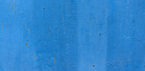 Old blue paint on aged wall