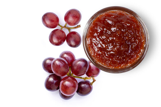 grapes  and red jam isolated on white
