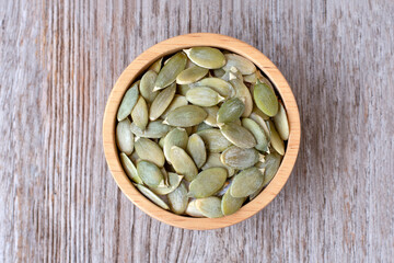 Pumpkin seed in wooden bowl