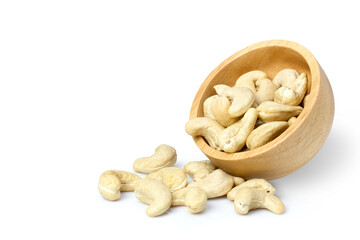 cashew nuts in wooden bowl isolated on white