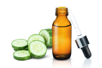 Cucumber essential oil in glass bottle and fresh cucumber slices isolated on white background.