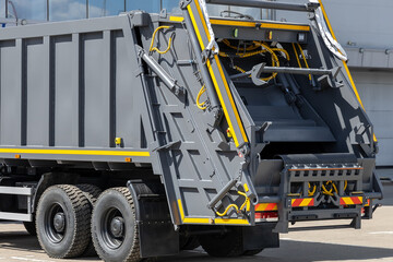 New garbage truck. Utility equipment. Municipal waste disposal equipment