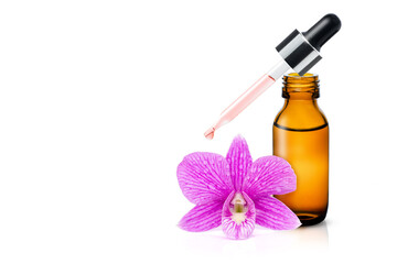 Fototapeta na wymiar Essential oils with orchid flowers