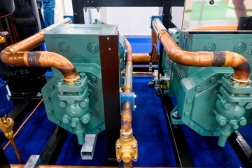 Copper pipes of the air conditioning system and part of the compressor