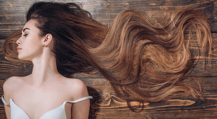 Long hair with copy space. Young woman with beautiful long hair.