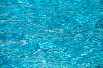 Water in swimming pool, background with high resolution. Wave abstract or rippled water texture.