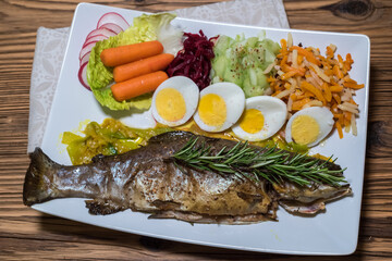 Carnivore grilled meat preparation. Roasted meal served on plate. 