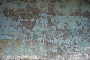 Texture of an old wall with peeling paint