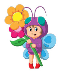 The girl with the butterfly costume is holding the flowers