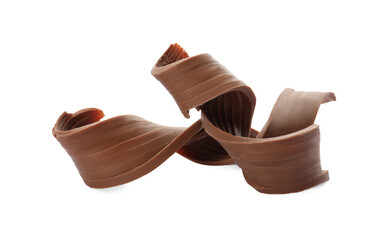 Yummy chocolate curls for decor on white background