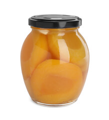 Glass jar with canned peach halves isolated on white