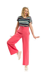 Smiling Stylish Young Woman In Red Wide Leg Trousers