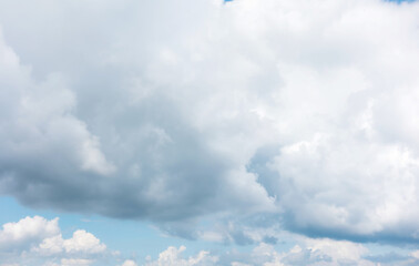 blue sky background with tiny clouds.