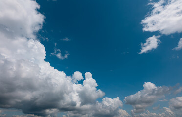 blue sky background with tiny clouds.