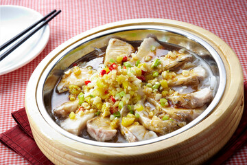 Delicious Chinese food, spicy and sour steamed fish