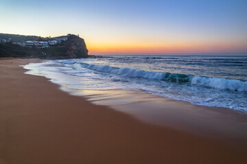 Fototapeta premium Clear skies aerial sunrise at the beach