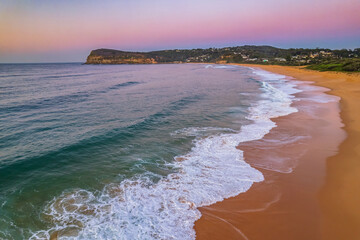 Clear skies aerial sunrise at the beach