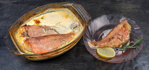 Redfish cooked in sour cream sauce in different glass tableware