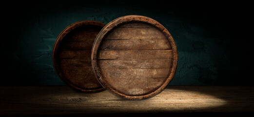 Old wooden barrel on a brown background