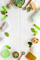 Fototapeta na wymiar Frame of green aroma spa tea tree cosmetics with essential oil