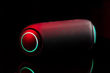 Portable wireless speaker isolated on a background. Connect with smartphone to play the music. 