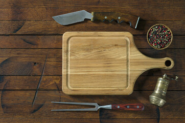 Kitchen utensils on wooden table