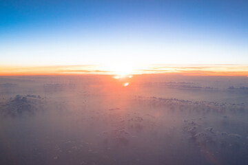 Fototapeta na wymiar the sunrise on a plane