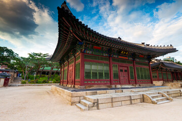 Fototapeta premium Side view of Deokhongjeon Hall in Deoksugung Palace, translation of inscription means Deokhongjeon, the name of this 1911 building. Seoul, South Korea.