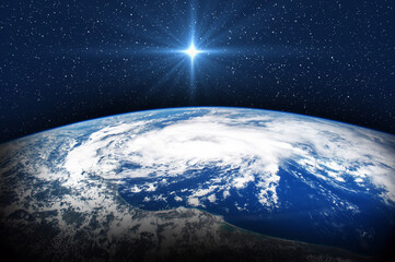 Christmas star over the Earth. Christmas of Jesus Christ. Elements of this image furnished by NASA