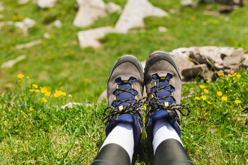 Traveler hiking boots on Beautiful mountain landscape view. Tourism or Freedom concept. Legs of...