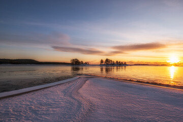  Lake Ladoga at dawn with fresh snow in winter