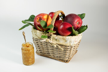 Horizontal shot Apple jam Apples in the basket on the white background 