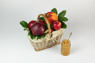 Apple jam Apples in the basket on the white background