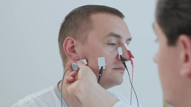 Patient nerves testing using electromyography at medical center