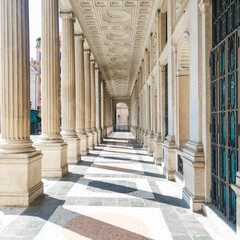 Perspective view of classic roman colonnade. Architectural details of the building.