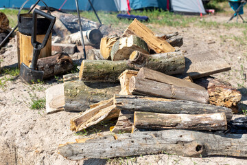 firewood on the shore in the camp