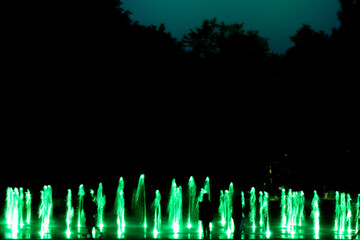 Night fountain with lights