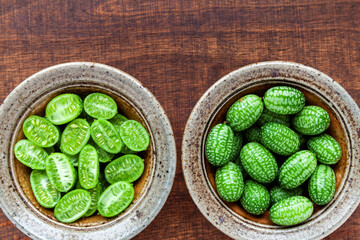 Cucamelon (Melothria scabra) in ceramic bowl. Own mouse melon organic fruits plant.