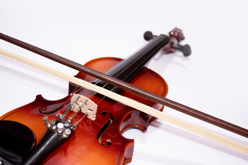 Front view of violin with Violin stick isolated on white background