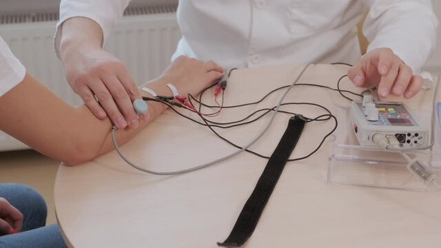 Patient nerves testing using electromyography at medical center